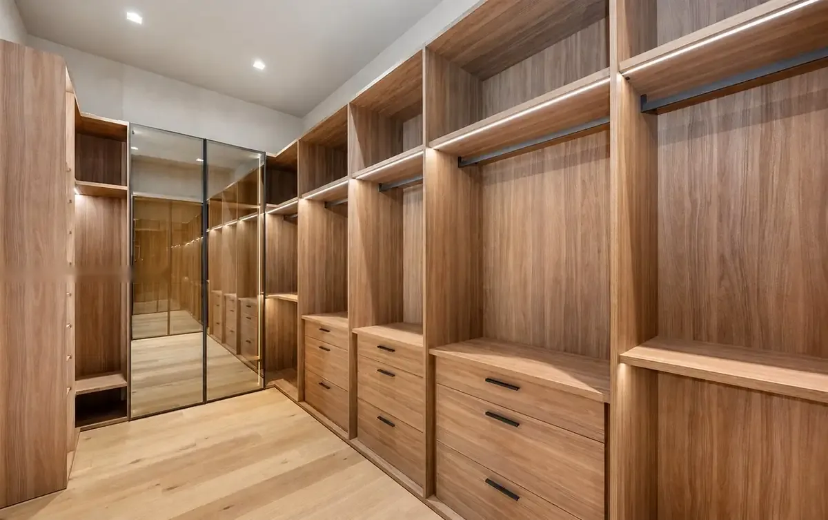 Primary walk-in closet — wide view
