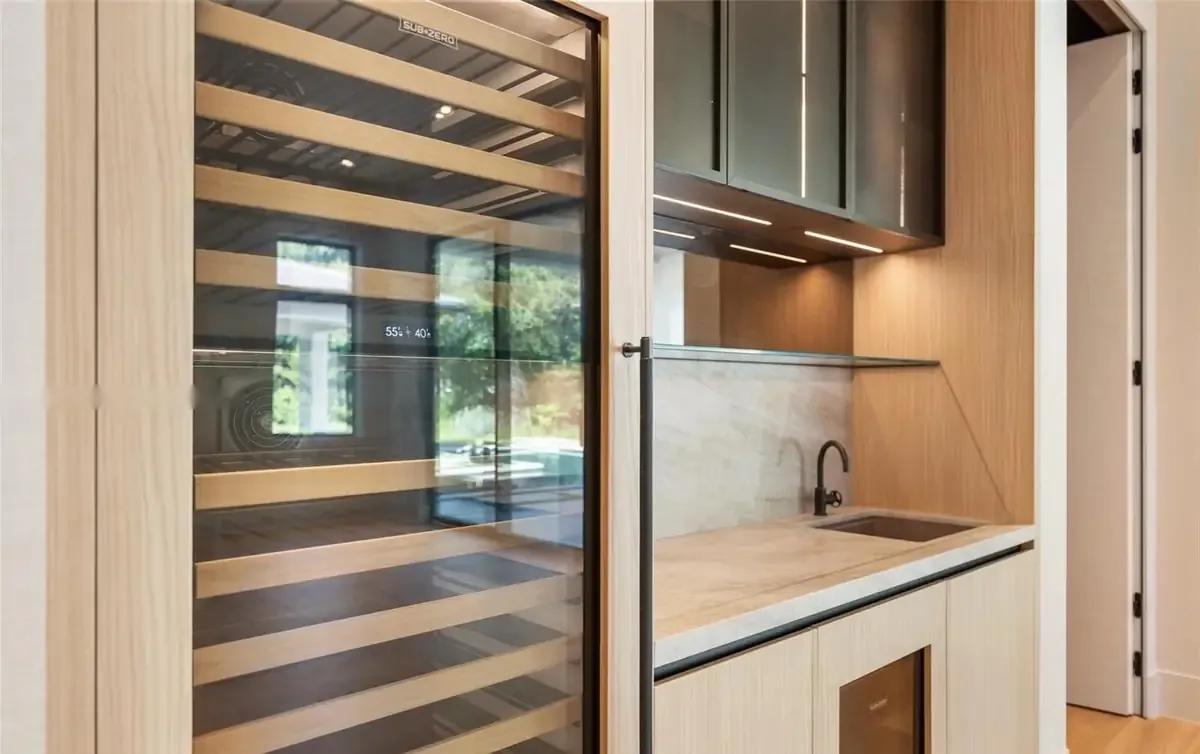 Coffee station and wine refrigeration in dark wood